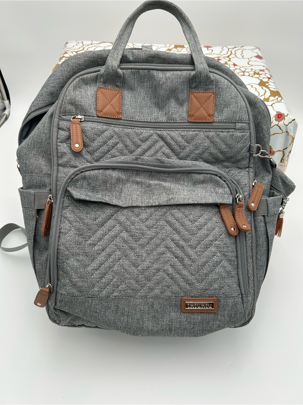 Gray Quilted Baby Bag Backpack with Brown Trim